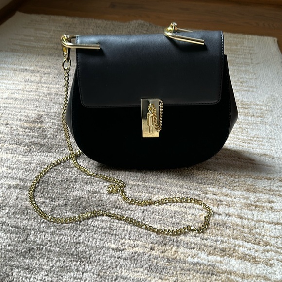 Handbags - NWOT black leather/suede Handbag